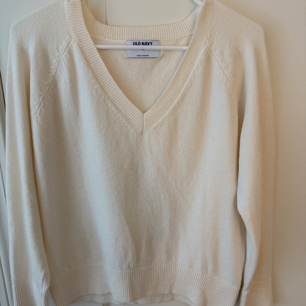 White V-neck sweater